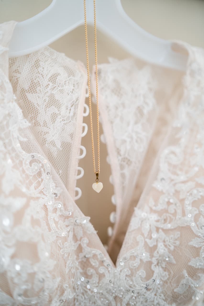 Close-up of a wedding dress with lace details, wedding dress photography